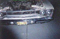 Lower plastic grille insert warped.